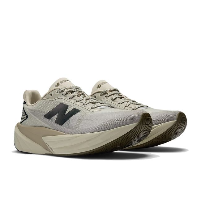 Pair of New Balance Women's FuelCell Rebel V5 Running Shoes in Shipyard/Arid Stone/Woodland beige