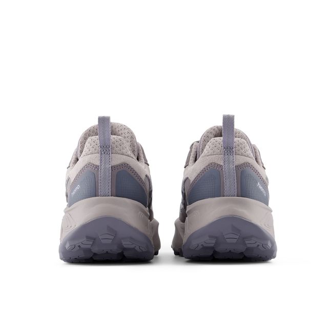 Rear heel view of the New Balance Hierro Trek pair in pale grey