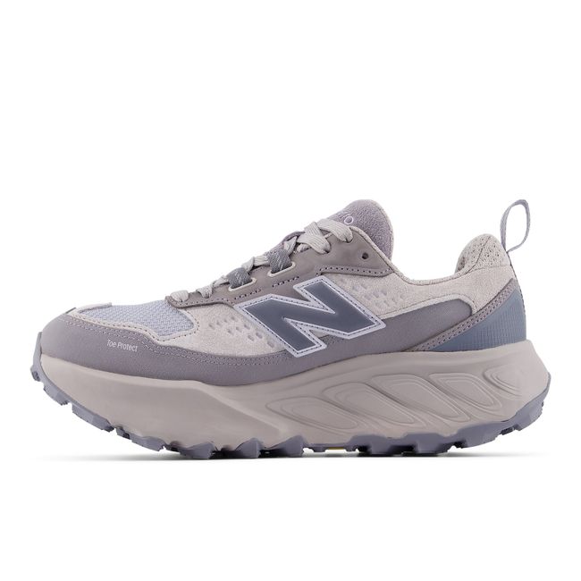 Medial profile of the New Balance Hierro Trek in pale grey with dove blue accents