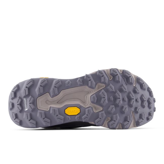 Vibram outsole of the New Balance Hierro Trek showing the deep trail lugs