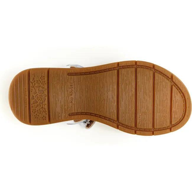 Sole of Kids Whitney Stride Rite Sandal in white leather upper and tan outsole