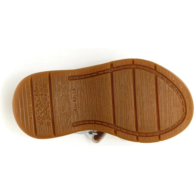 Sole of Little Kids Whitney Stride Rite Sandal in white leather upper with tan outsole