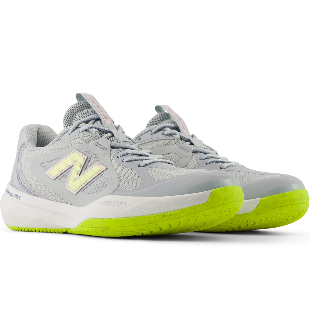 Pair of New Balance Women's SmashStep PKL pickleball shoes in Light Zinc Blue/Pink Granite/Glint Blue