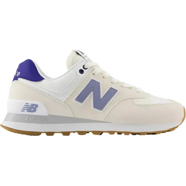 Lateral of New Balance Women's 574 Lifestyle Shoe in linen beige and indigo
