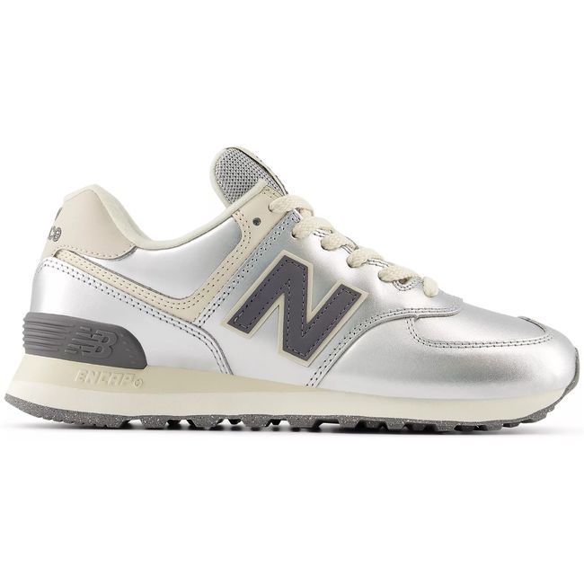 New Balance 574 in metallic silver with cream panels and a grey N, lateral view