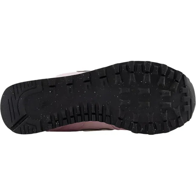 Sole of New Balance Women's 574 Lifestyle Shoe in rose sugar pink with black tread
