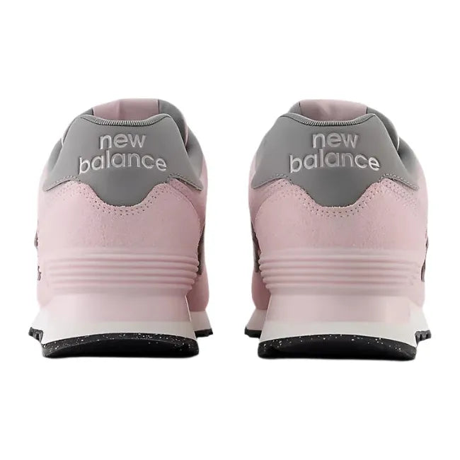 Heels of New Balance Women's 574 Lifestyle Shoes in rose sugar pink