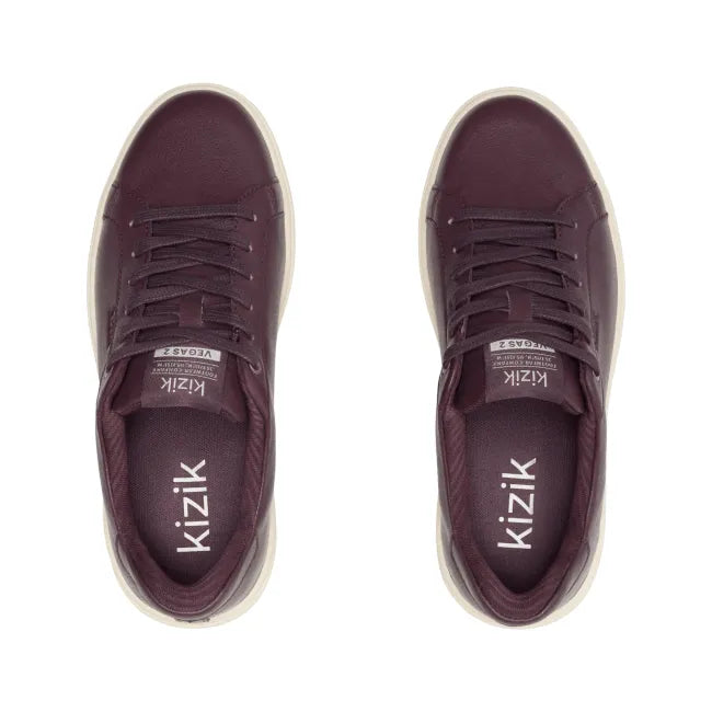 Upper of Women’s Kizik Vegas 2 Sneakers in brown/red with off-white sole and handsfree step in