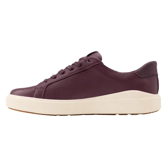Medial side of Women’s Kizik Vegas 2 Sneaker in brown/red with off-white sole and handsfree step in