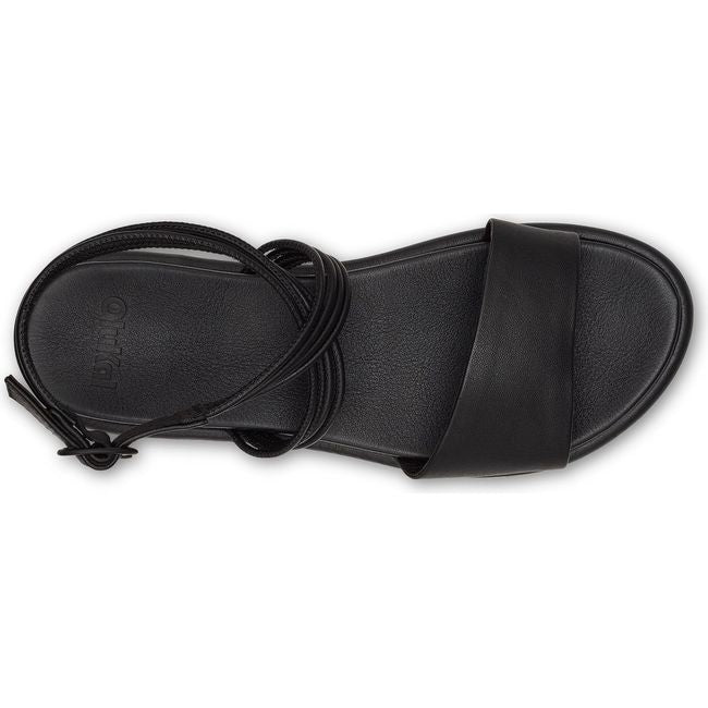 Top down view of Women's Olukai Tiare Wrap Sandal in Black leather