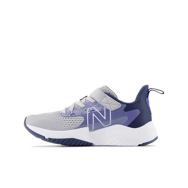 Medial side of New Balance Kids&#39; Rave Run V2 Velcro Running Shoe in Grey &amp; Navy
