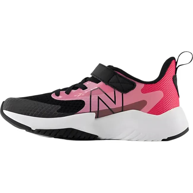 Medial of New Balance Kids' Rave Run V2 Velcro Top Strap Running Shoe in signal pink and black