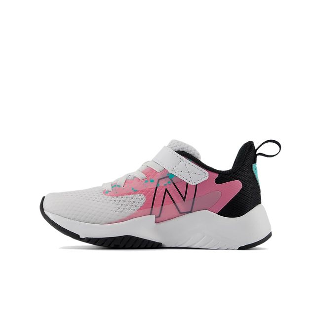 Medial side of New Balance Kids' Rave Run V2 Running Shoe in White, Real Pink & Black with velcro strap