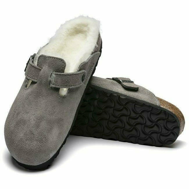 Upper and sole of Birkenstock Unisex Boston Shearling Clogs in stone coin grey suede