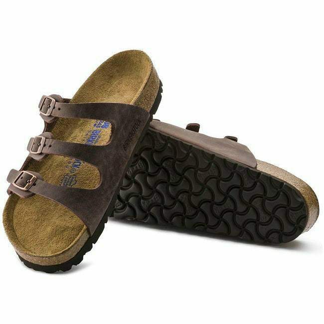 Pair of  brown Birkenstock Florida soft footbed sandal. One showing the sole, the other the upper