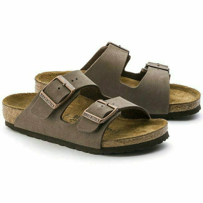 Pair of Mocha suede Birkenstock Kids&#39; Arizona sandals with two adjustable straps and cork footbeds.