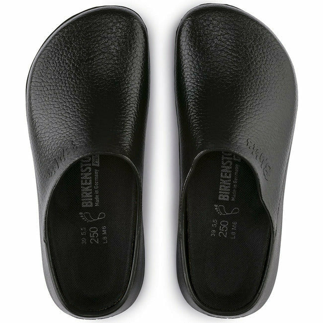 Top view of a pair of black Birkenstock Professional Super Birki clogs for healthcare and utility, featuring water-resistant and dirt-repellent polyurethane exteriors, black removable cork-latex footbeds, and &