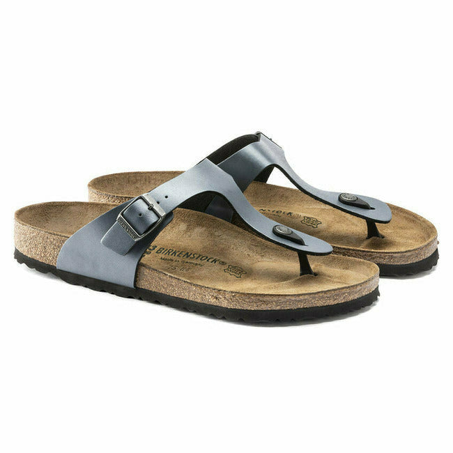 Pair of a silver Birkenstock Gizeh sandals with adjustable metal buckles and cork footbeds