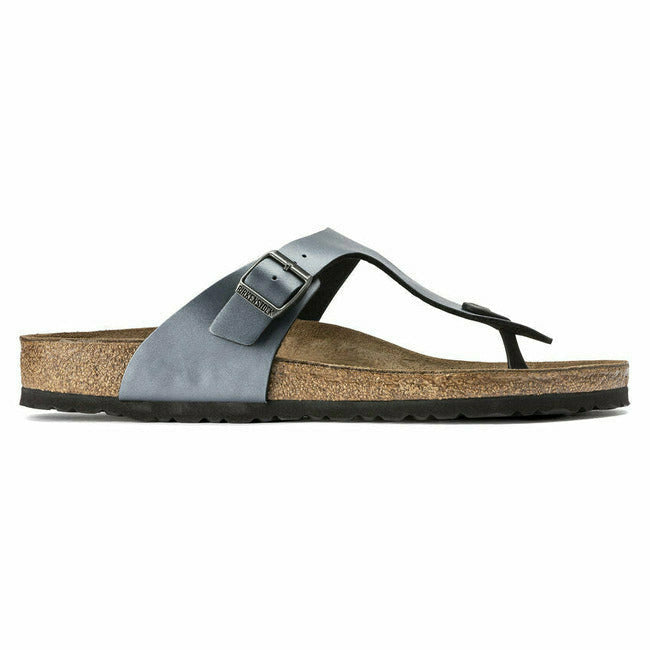 Side of a silver Birkenstock Gizeh sandal with adjustable metal buckle and cork footbed