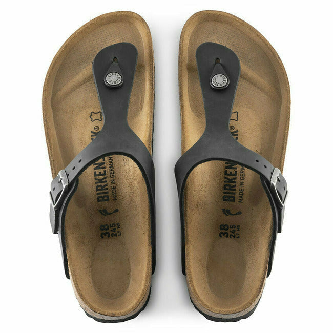 Top-down view of the Black Birkenstock Gizeh oiled leather sandals with buckles and cork footbeds