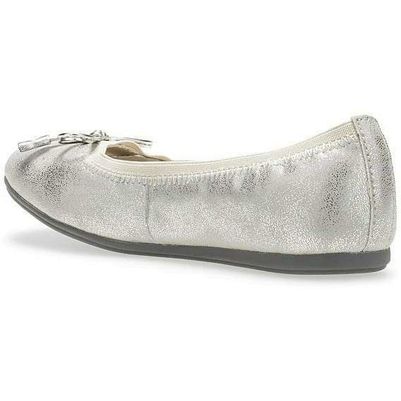 Medial angled view of Kids Hush Puppies Josie Flat in silver with a bow tie