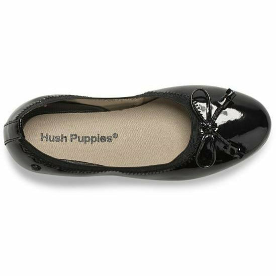 Top down view of Kids Hush Puppies Josie Flat in patent black with a bow tie